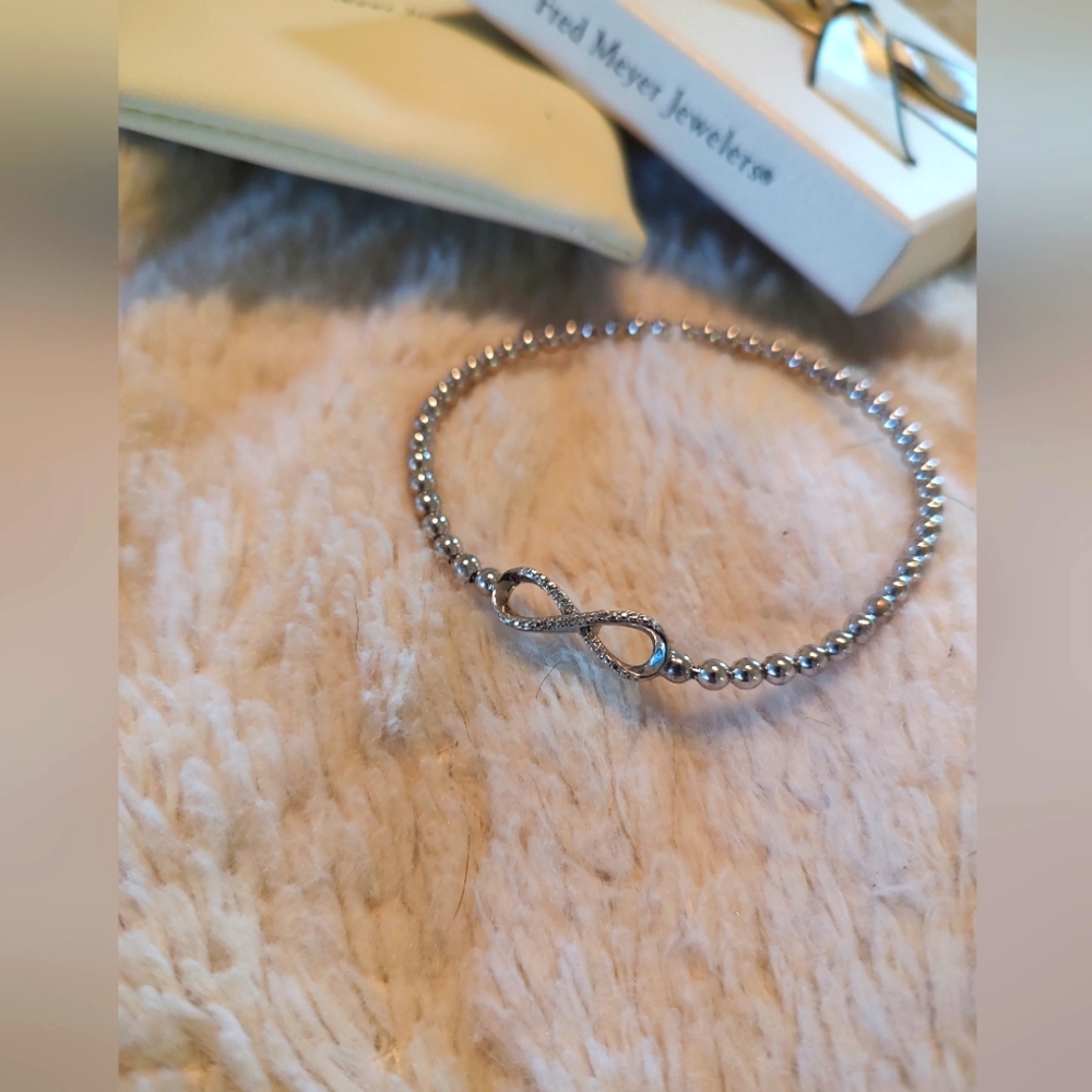 Fred Meyers sterling silver infinity bracelet